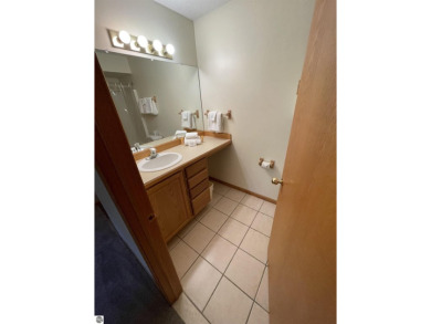 Rare opportunity to own a 3BR/3BA maintenance free condo at NW on A-Ga-Ming Golf Resort in Michigan - for sale on GolfHomes.com, golf home, golf lot