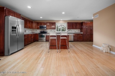 Your Poconos retreat starts here. Designed for comfort, space on Country Club of the Poconos Golf Course in Pennsylvania - for sale on GolfHomes.com, golf home, golf lot