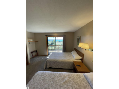 Rare opportunity to own a 3BR/3BA maintenance free condo at NW on A-Ga-Ming Golf Resort in Michigan - for sale on GolfHomes.com, golf home, golf lot