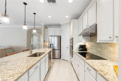 PREMIUM GOLF COURSE & WATER VIEW -- This beautiful home offers on Panther Run Golf Club in Florida - for sale on GolfHomes.com, golf home, golf lot