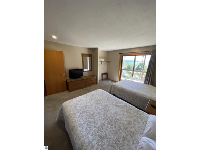 Rare opportunity to own a 3BR/3BA maintenance free condo at NW on A-Ga-Ming Golf Resort in Michigan - for sale on GolfHomes.com, golf home, golf lot