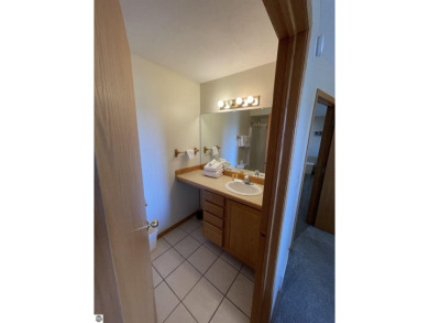 Rare opportunity to own a 3BR/3BA maintenance free condo at NW on A-Ga-Ming Golf Resort in Michigan - for sale on GolfHomes.com, golf home, golf lot