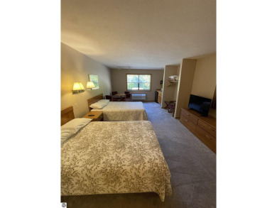 Rare opportunity to own a 3BR/3BA maintenance free condo at NW on A-Ga-Ming Golf Resort in Michigan - for sale on GolfHomes.com, golf home, golf lot