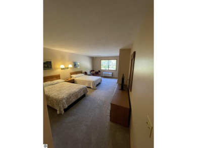 Rare opportunity to own a 3BR/3BA maintenance free condo at NW on A-Ga-Ming Golf Resort in Michigan - for sale on GolfHomes.com, golf home, golf lot