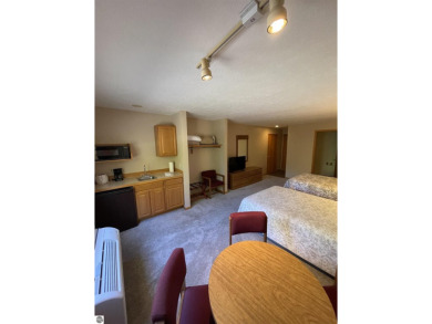 Rare opportunity to own a 3BR/3BA maintenance free condo at NW on A-Ga-Ming Golf Resort in Michigan - for sale on GolfHomes.com, golf home, golf lot