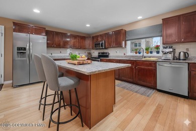 Your Poconos retreat starts here. Designed for comfort, space on Country Club of the Poconos Golf Course in Pennsylvania - for sale on GolfHomes.com, golf home, golf lot