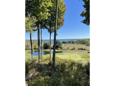 Rare opportunity to own a 3BR/3BA maintenance free condo at NW on A-Ga-Ming Golf Resort in Michigan - for sale on GolfHomes.com, golf home, golf lot