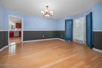 Your Poconos retreat starts here. Designed for comfort, space on Country Club of the Poconos Golf Course in Pennsylvania - for sale on GolfHomes.com, golf home, golf lot