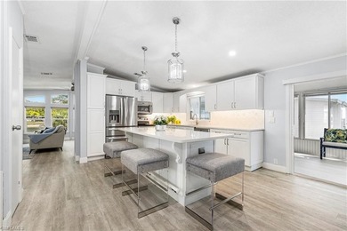 This beautiful lake front home is located in the highly on Glen Eagle Golf and Country Club in Florida - for sale on GolfHomes.com, golf home, golf lot