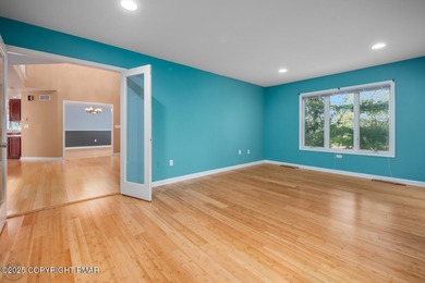 Your Poconos retreat starts here. Designed for comfort, space on Country Club of the Poconos Golf Course in Pennsylvania - for sale on GolfHomes.com, golf home, golf lot