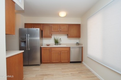 This charming home offers 2 bedrooms, 2 bathrooms, plus a on Pebblebrook Golf Course in Arizona - for sale on GolfHomes.com, golf home, golf lot