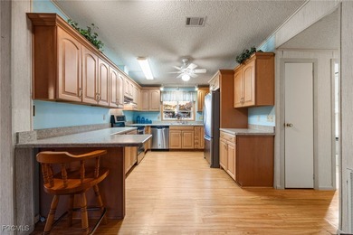 This beautiful affordable home, has it all. From golfing to on Pine Lakes Country Club in Florida - for sale on GolfHomes.com, golf home, golf lot