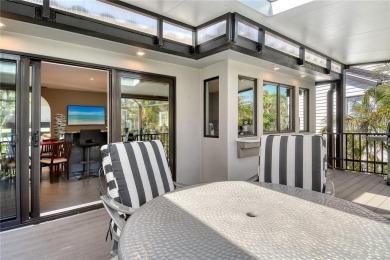 Welcome to this elevated retreat in the sought-after Bayou on Longboat Key Golf Club Resort in Florida - for sale on GolfHomes.com, golf home, golf lot