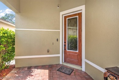 Darling Villa with screened lanai overlooking the 12th green of on Lehigh Resort Club in Florida - for sale on GolfHomes.com, golf home, golf lot