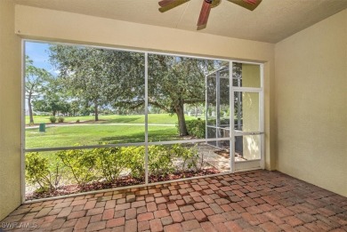 Darling Villa with screened lanai overlooking the 12th green of on Lehigh Resort Club in Florida - for sale on GolfHomes.com, golf home, golf lot