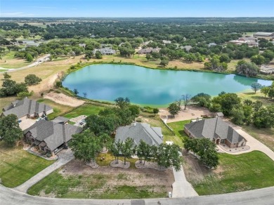 MAGNIFICENT WATERFRONT CUSTOM HOME SITUATED IN THE ESTEEMED on Sugar Tree Golf and Country Club in Texas - for sale on GolfHomes.com, golf home, golf lot