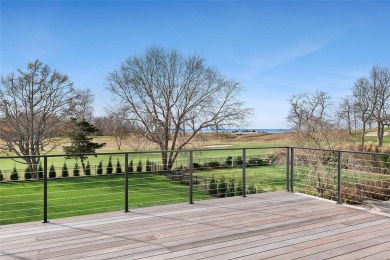 This stunning new custom home offers beautiful water views of on Islands End Golf and Country Club, Inc. in New York - for sale on GolfHomes.com, golf home, golf lot