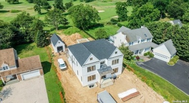 This is a beautiful new luxury home with water views of the Long on Islands End Golf and Country Club, Inc. in New York - for sale on GolfHomes.com, golf home, golf lot