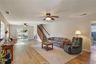 Discover warmth and comfort with this beautifully upgraded pool on Heartwell Golf Course in California - for sale on GolfHomes.com, golf home, golf lot