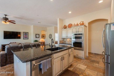 Sitting on a corner lot, this SEDONA model is in the 55+ adult on Lone Tree Golf Club in Arizona - for sale on GolfHomes.com, golf home, golf lot