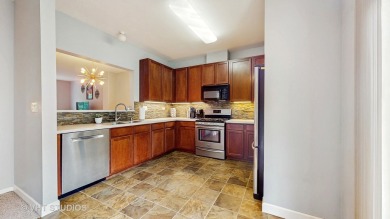 This move-in ready model-like unit has been immaculately on Cary Country Club in Illinois - for sale on GolfHomes.com, golf home, golf lot