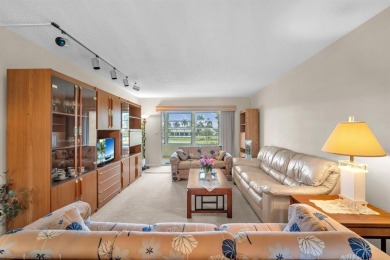 Welcome to this charming 55+ condo featuring tile flooring in on Wynmoor Golf Course in Florida - for sale on GolfHomes.com, golf home, golf lot