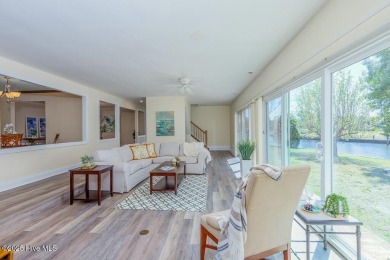 Experience unparalleled waterfront living in this extraordinary on Harbour Point Golf Club in North Carolina - for sale on GolfHomes.com, golf home, golf lot