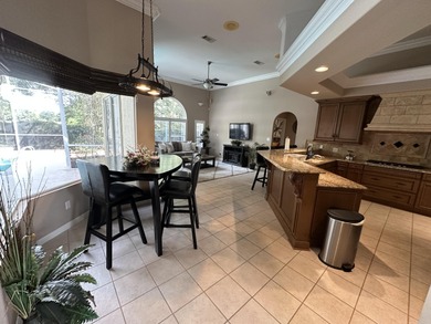 Enjoy the exceptional location of 472 Indigo Loop within the on Emerald Bay Golf Club in Florida - for sale on GolfHomes.com, golf home, golf lot