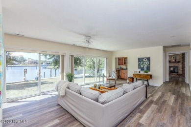 Experience unparalleled waterfront living in this extraordinary on Harbour Point Golf Club in North Carolina - for sale on GolfHomes.com, golf home, golf lot