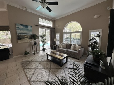Enjoy the exceptional location of 472 Indigo Loop within the on Emerald Bay Golf Club in Florida - for sale on GolfHomes.com, golf home, golf lot