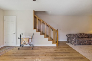 Discover warmth and comfort with this beautifully upgraded pool on Heartwell Golf Course in California - for sale on GolfHomes.com, golf home, golf lot