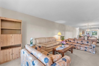 Welcome to this charming 55+ condo featuring tile flooring in on Wynmoor Golf Course in Florida - for sale on GolfHomes.com, golf home, golf lot
