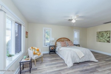 Experience unparalleled waterfront living in this extraordinary on Harbour Point Golf Club in North Carolina - for sale on GolfHomes.com, golf home, golf lot