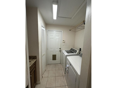 Enjoy the exceptional location of 472 Indigo Loop within the on Emerald Bay Golf Club in Florida - for sale on GolfHomes.com, golf home, golf lot