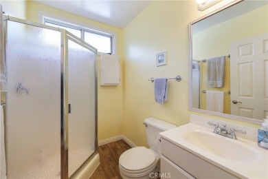 Discover warmth and comfort with this beautifully upgraded pool on Heartwell Golf Course in California - for sale on GolfHomes.com, golf home, golf lot