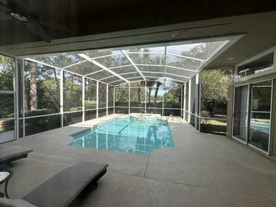 Enjoy the exceptional location of 472 Indigo Loop within the on Emerald Bay Golf Club in Florida - for sale on GolfHomes.com, golf home, golf lot