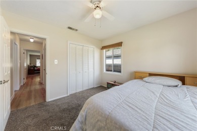 Discover warmth and comfort with this beautifully upgraded pool on Heartwell Golf Course in California - for sale on GolfHomes.com, golf home, golf lot