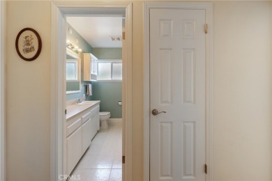 Discover warmth and comfort with this beautifully upgraded pool on Heartwell Golf Course in California - for sale on GolfHomes.com, golf home, golf lot