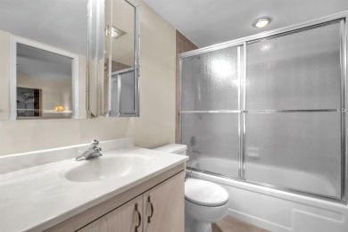 Welcome to this charming 55+ condo featuring tile flooring in on Wynmoor Golf Course in Florida - for sale on GolfHomes.com, golf home, golf lot