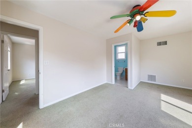Discover warmth and comfort with this beautifully upgraded pool on Heartwell Golf Course in California - for sale on GolfHomes.com, golf home, golf lot