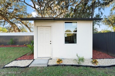 Discover modern living in this beautifully updated 3-bedroom on San Jose Country Club in Florida - for sale on GolfHomes.com, golf home, golf lot