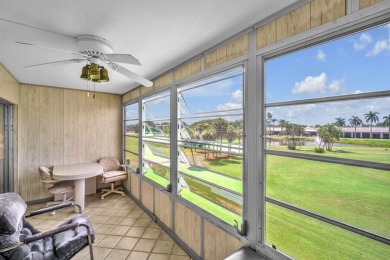 Welcome to this charming 55+ condo featuring tile flooring in on Wynmoor Golf Course in Florida - for sale on GolfHomes.com, golf home, golf lot
