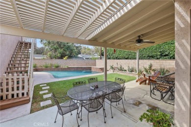 Discover warmth and comfort with this beautifully upgraded pool on Heartwell Golf Course in California - for sale on GolfHomes.com, golf home, golf lot