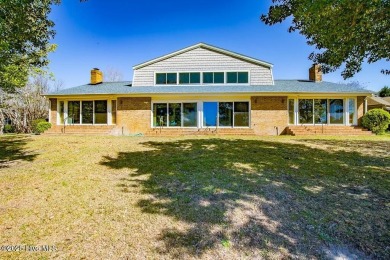 Experience unparalleled waterfront living in this extraordinary on Harbour Point Golf Club in North Carolina - for sale on GolfHomes.com, golf home, golf lot
