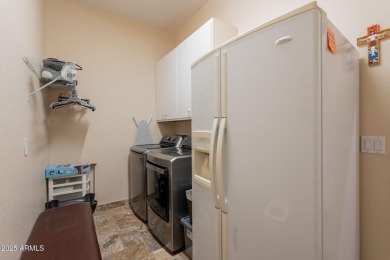 Sitting on a corner lot, this SEDONA model is in the 55+ adult on Lone Tree Golf Club in Arizona - for sale on GolfHomes.com, golf home, golf lot