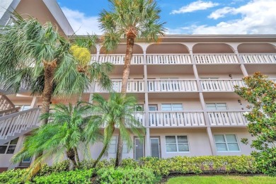 Welcome to this charming 55+ condo featuring tile flooring in on Wynmoor Golf Course in Florida - for sale on GolfHomes.com, golf home, golf lot