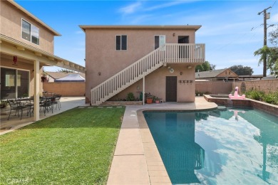 Discover warmth and comfort with this beautifully upgraded pool on Heartwell Golf Course in California - for sale on GolfHomes.com, golf home, golf lot