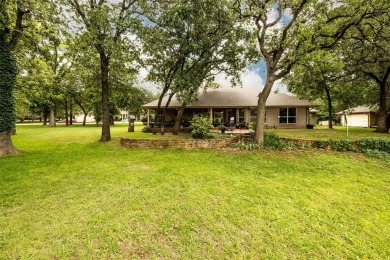 Stunning 3-bedroom, 2-bathroom, 4-car garage, home with new AC & on The Club At Runaway Bay in Texas - for sale on GolfHomes.com, golf home, golf lot