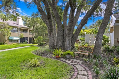 Discover your new home nestled within The Cloisters at Bardmoor on Bardmoor Golf and Tennis Club in Florida - for sale on GolfHomes.com, golf home, golf lot