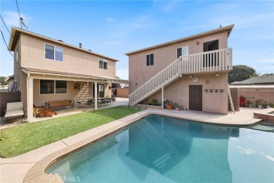 Discover warmth and comfort with this beautifully upgraded pool on Heartwell Golf Course in California - for sale on GolfHomes.com, golf home, golf lot